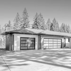 new garage doors on a house that are meant to enhance curb appeal